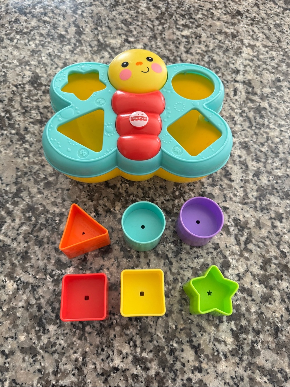 Fisher-Price Teal, Yellow & Red Butterfly Shape Sorter with Colorful Pieces